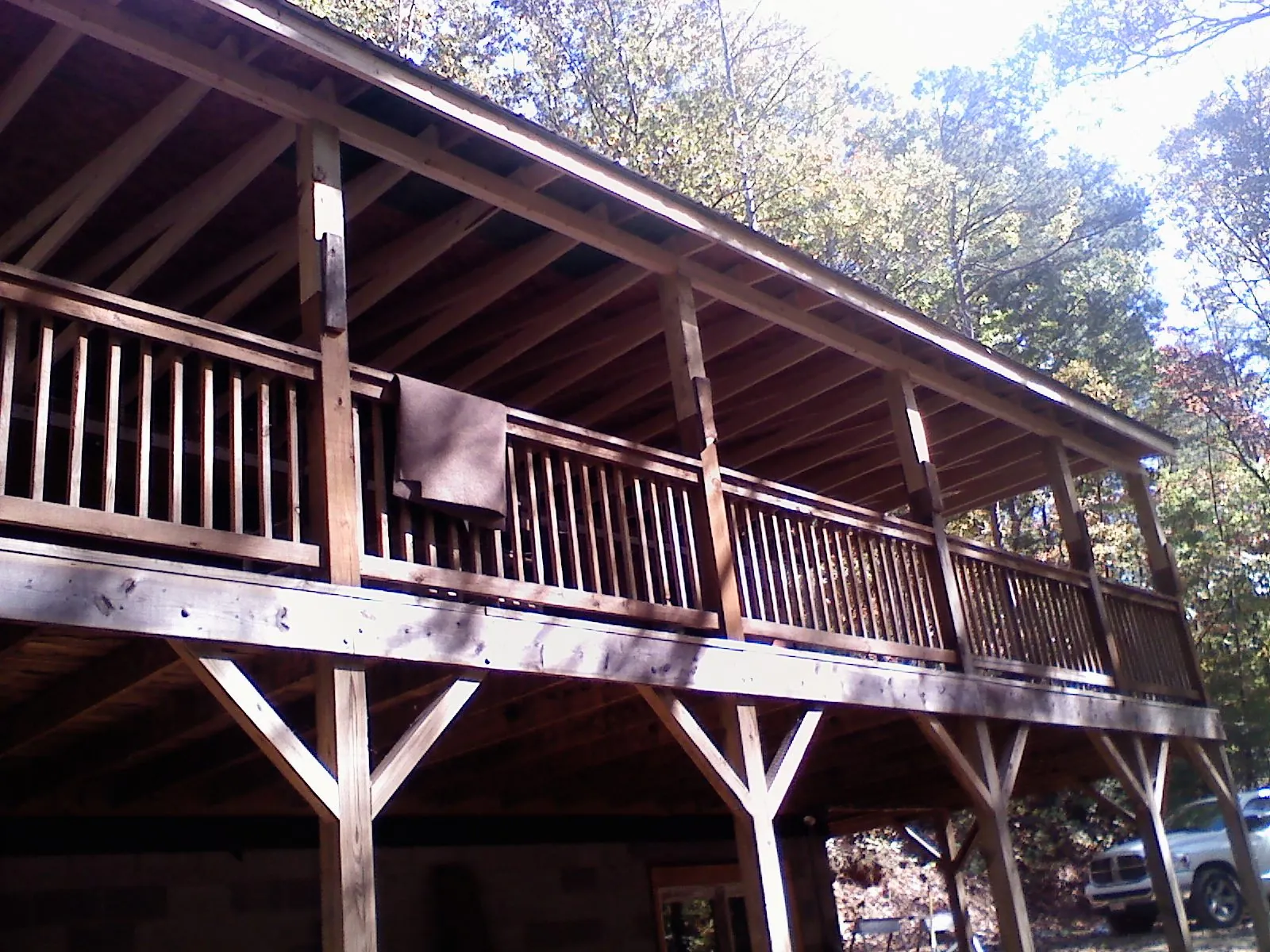 Timber framing under a new elevated porch and deck — Roof Leak Repair in Clanton by Roofing Brothers